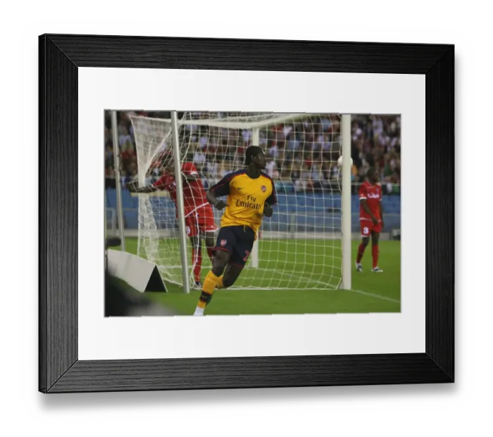 Framed Print : Emmanuel Adebayor celebrates scoring the 2nd Arssenal goal