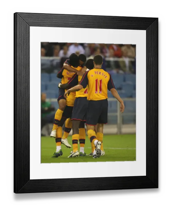Framed Print : Adebayor's Double: Arsenal's Celebration after Scoring against FC Twente (Eboue, Walcott, van Persie)