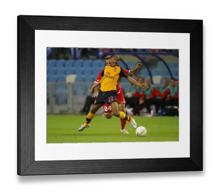 Framed Print : Arsenal's Clichy Shines in 2-0 Champions League Victory over FC Twente's Arnautovic Framed Print : Arsenal's Clichy Shines in 2-0 Champions League Victory over FC Twente's Arnautovic