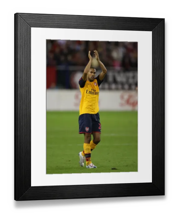 Framed Print : Gael Clichy (Arsenal) waves to the Arsenal fans after the match