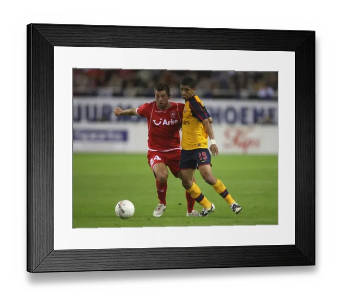 Framed Print : Denulson (Arsenal) Theo Janssen (FC Twente)