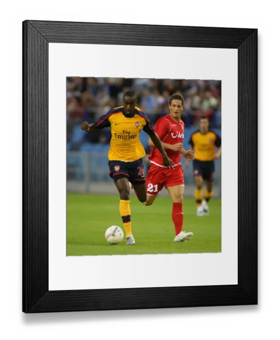 Framed Print : Arsenal's Djourou Shines in 2-0 Champions League Victory over FC Twente's Arnautovic Framed Print : Arsenal's Djourou Shines in 2-0 Champions League Victory over FC Twente's Arnautovic
