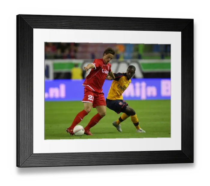 Framed Print : Djourou's Dominance: Arsenal's Win Over Twente, 2-0 in Champions League Qualifier Framed Print : Djourou's Dominance: Arsenal's Win Over Twente, 2-0 in Champions League Qualifier
