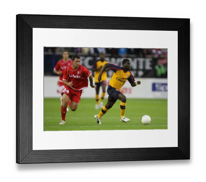 Framed Print : Emmanuel Eboue (Arsenal) Theo Janssen (FC Twente) Framed Print : Emmanuel Eboue (Arsenal) Theo Janssen (FC Twente)