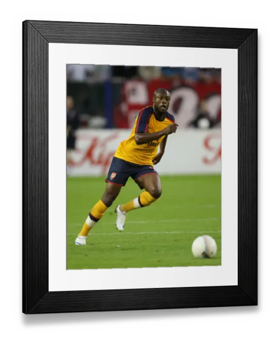 Framed Print : William Gallas Leads Arsenal to 2-0 Victory over FC Twente in Champions League Qualifier