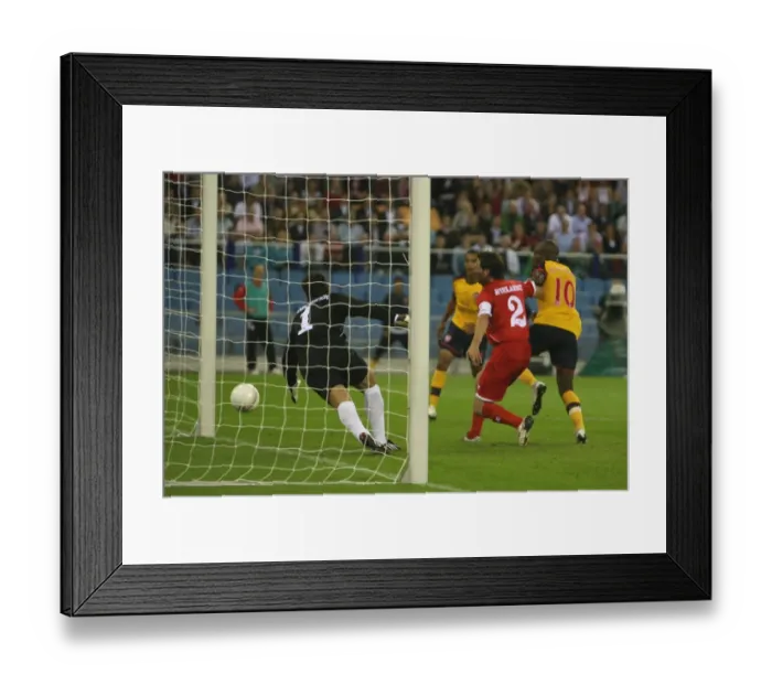 Framed Print : William Gallas shoots past FC Twente goalkeeper Sander Framed Print : William Gallas shoots past FC Twente goalkeeper Sander