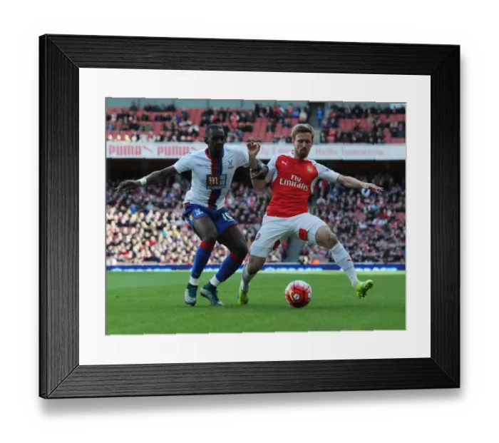 Framed Print : Monreal Stands Firm Against Bolasie in Intense Arsenal vs. Crystal Palace Clash (2015-16)
