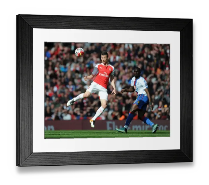 Framed Print : Koscielny's Aerial Battle: Arsenal vs. Crystal Palace