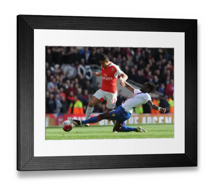Framed Print : Sanchez vs. Souare: A Clash at Emirates in Arsenal vs. Crystal Palace Framed Print : Sanchez vs. Souare: A Clash at Emirates in Arsenal vs. Crystal Palace