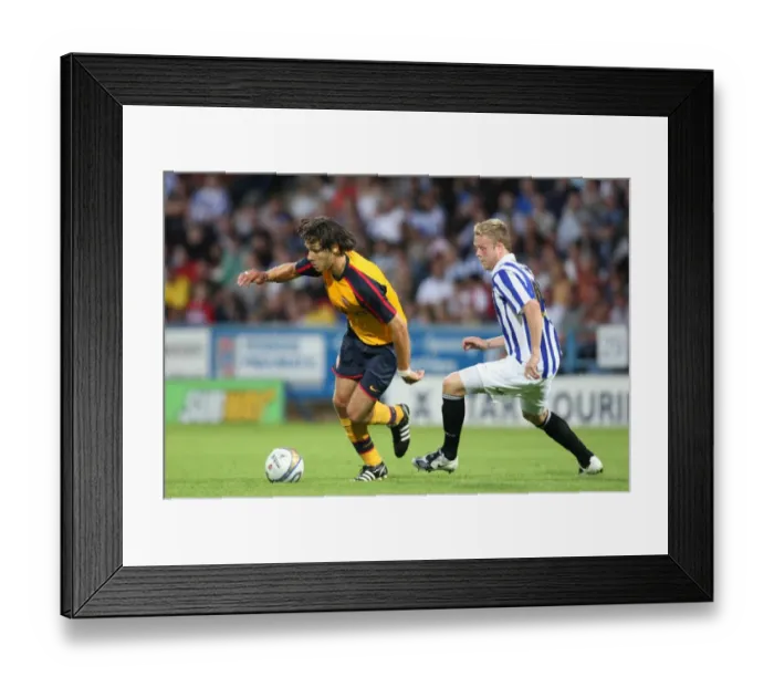Framed Print : Nacar Barazite turns the defender on his way to scoring Framed Print : Nacar Barazite turns the defender on his way to scoring