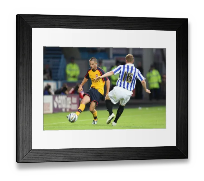 Framed Print : Henri Lansbury (Arsenal) Robbie Williams (Huddersfield) Framed Print : Henri Lansbury (Arsenal) Robbie Williams (Huddersfield)