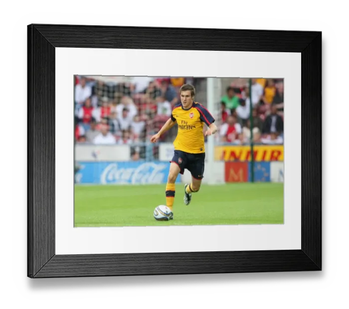 Framed Print : Aaron Ramsey's Debut: Arsenal's Pre-Season Victory Over Huddersfield (2-1) Framed Print : Aaron Ramsey's Debut: Arsenal's Pre-Season Victory Over Huddersfield (2-1)