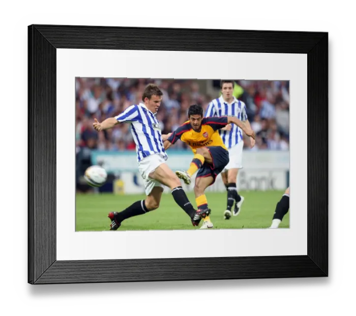 Framed Print : Carlos vela (Arsenal) Andy Butler (Huddersfield) Framed Print : Carlos vela (Arsenal) Andy Butler (Huddersfield)