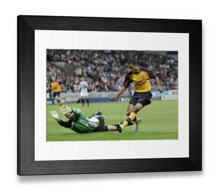 Framed Print : Theo Walcott (Arsenal) Matt Glennon (Huddersfield)
