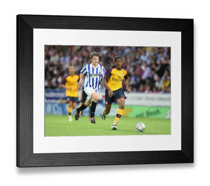Framed Print : Sanchez Watt (Arsenal) James Berrett (Huddersfield) Framed Print : Sanchez Watt (Arsenal) James Berrett (Huddersfield)