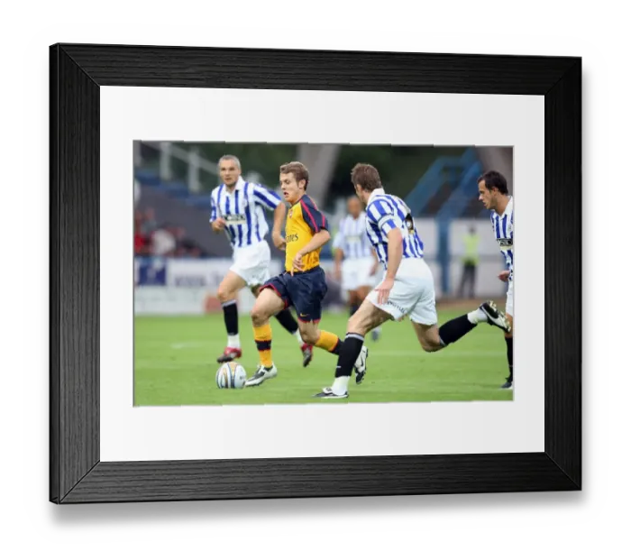 Framed Print : Jack Wilshere (Arsenal) Chris Lucketti (Huddersfield)