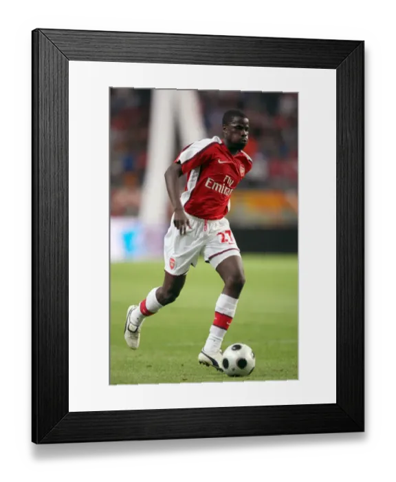 Framed Print : Emmanuel Eboue's Triumph: Arsenal's Comeback Win Against Ajax in the Amsterdam Tournament (August 8, 2008)
