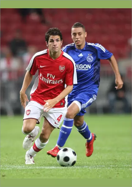 Cesc Fabregas (Arsenal) Ismail Assati (Ajax)