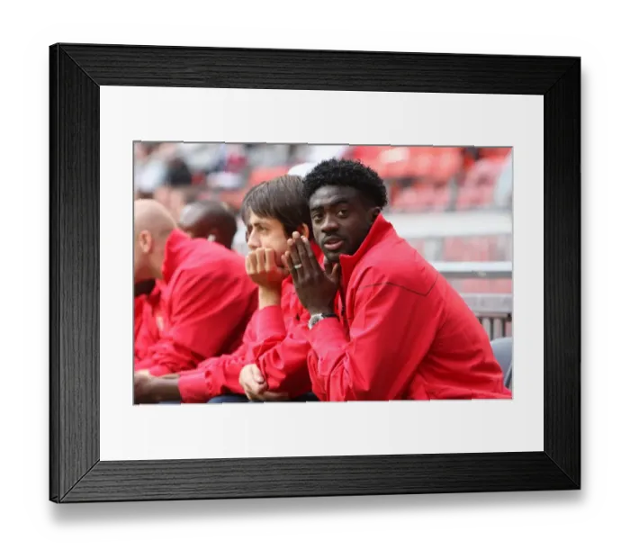 Framed Print : Arsenal's Triumph: Kolo Toure's Unforgettable Performance in Arsenal's 3-2 Victory Over Ajax at Amsterdam ArenA, 2008