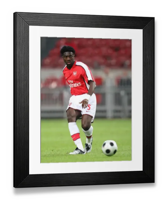 Framed Print : Kolo Toure: Heroic Performance in Arsenal's 3-2 Victory over Ajax at Amsterdam ArenA, 2008