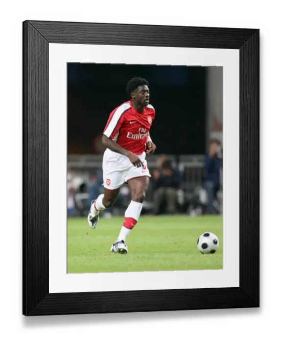 Framed Print : Kolo Toure's Triumph: Arsenal's 3-2 Win Over Ajax at Amsterdam ArenA, 2008