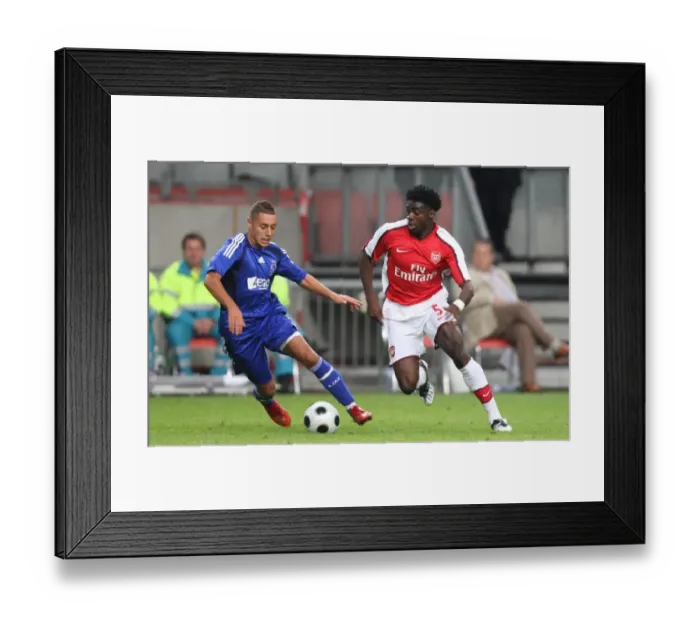 Framed Print : Kolo Toure (Arsenal) Ismail Assati (Ajax) Framed Print : Kolo Toure (Arsenal) Ismail Assati (Ajax)