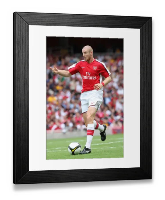 Framed Print : Philippe Senderos Euphoria: Arsenal's Historic 1-0 Win Over Real Madrid at Emirates Cup, 2008