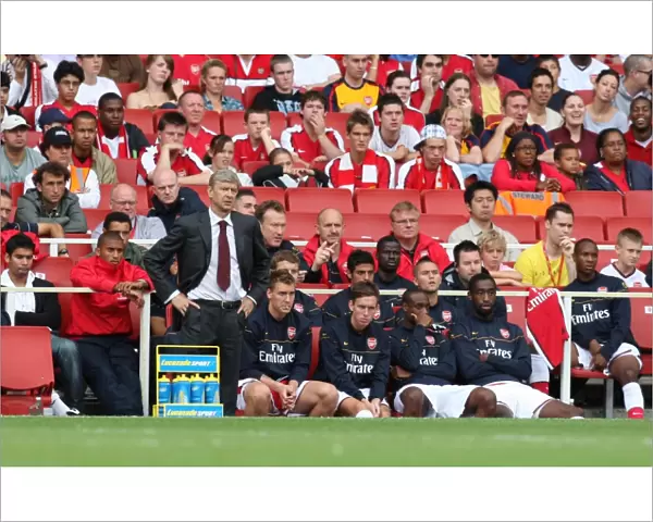 Arsene Wenger the Arsenal Manager with Lucazade bottles