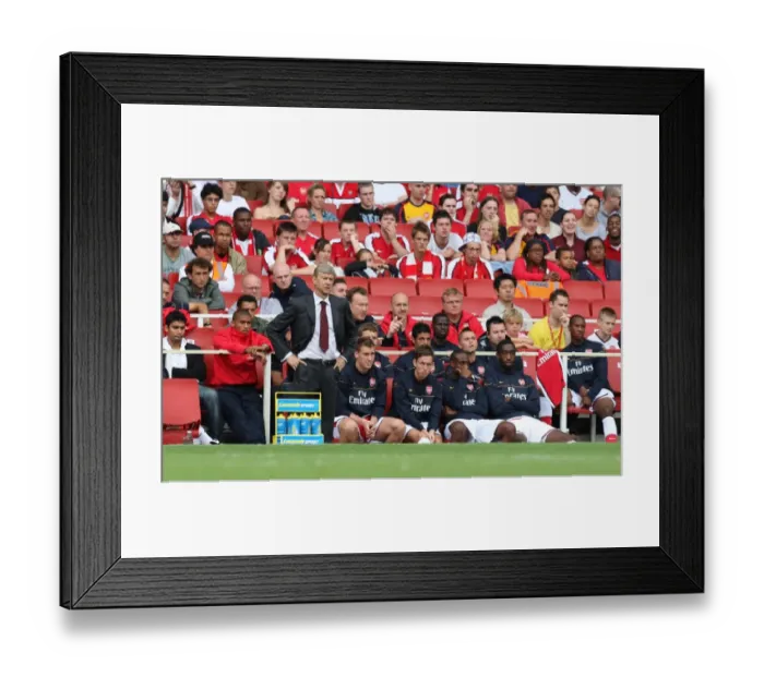 Framed Print : Arsene Wenger the Arsenal Manager with Lucazade bottles