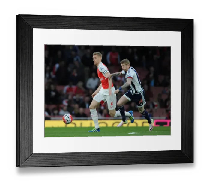 Framed Print : Arsenal's Per Mertesacker Outsmarts James McClean in Thrilling 2015-16 Premier League Showdown Framed Print : Arsenal's Per Mertesacker Outsmarts James McClean in Thrilling 2015-16 Premier League Showdown