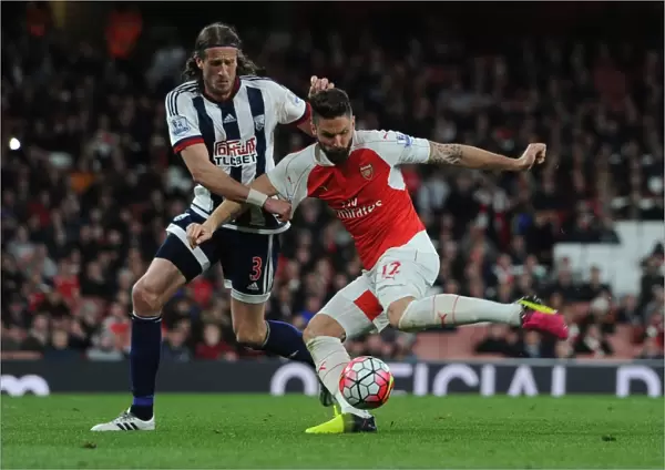 Arsenal's Olivier Giroud Battles Jonas Olsson in Intense Premier League Showdown