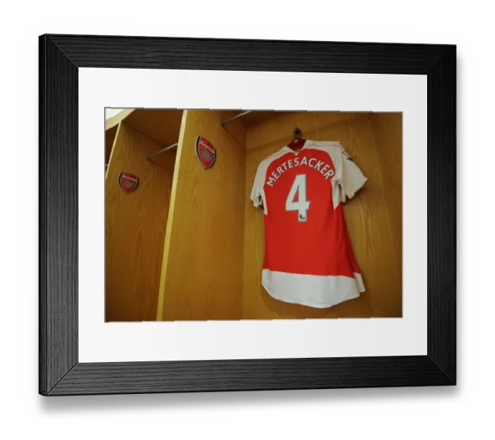 Framed Print : Per Mertesacker's Arsenal Shirt in Arsenal Changing Room Before Arsenal vs West Bromwich Albion (2015-16)