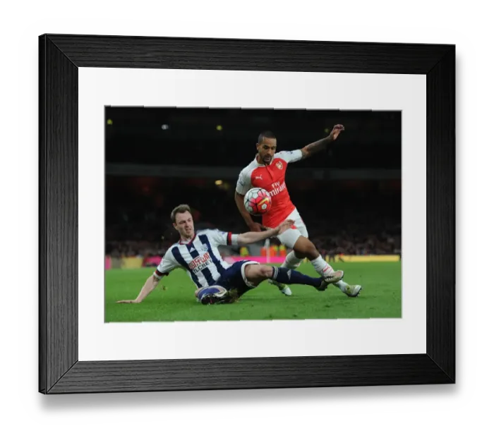 Framed Print : Theo Walcott's Intense Chase Down of Jonny Evans: A Thrilling Moment from Arsenal vs. West Bromwich Albion (2015-16) Framed Print : Theo Walcott's Intense Chase Down of Jonny Evans: A Thrilling Moment from Arsenal vs. West Bromwich Albion (2015-16)