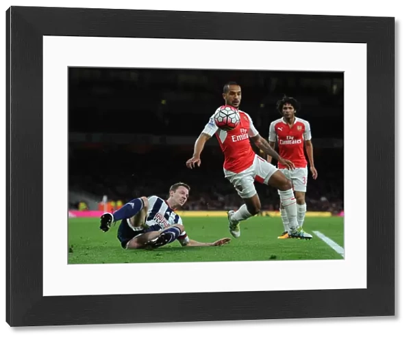 Theo Walcott vs Jonny Evans: A Battle of Determination in Arsenal vs West Bromwich Albion (2015-16)