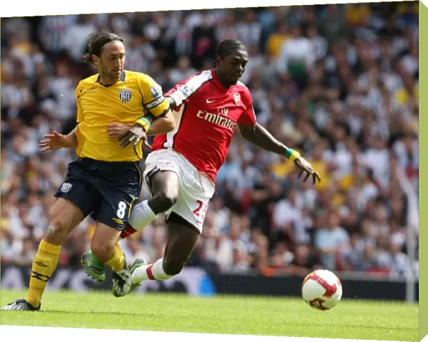 Emmanuel Adebayor (Arsenal) Jonathan Greening (WBA)