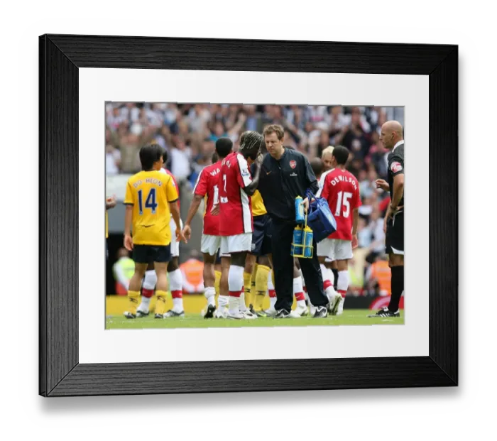 Framed Print : Bacary Sagna and Arsenal physio Colin Lewin Framed Print : Bacary Sagna and Arsenal physio Colin Lewin