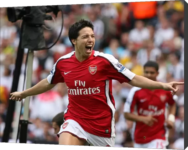 Samir Nasri celebrates scoring the Arsenal goal