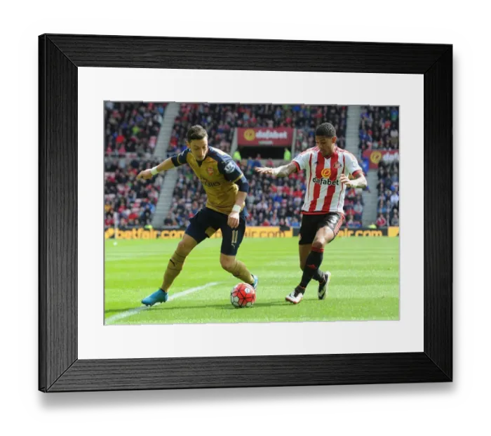 Framed Print : Intense Battle: Mesut Ozil vs. Patrick van Aanholt at Sunderland's Stadium of Light (Arsenal vs. Sunderland, Premier League 2015-16) Framed Print : Intense Battle: Mesut Ozil vs. Patrick van Aanholt at Sunderland's Stadium of Light (Arsenal vs. Sunderland, Premier League 2015-16)