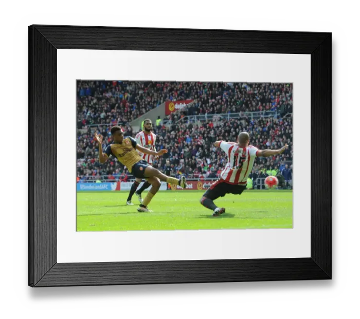 Framed Print : Intense Showdown: Iwobi vs. Kaboul in Arsenal's Battle against Sunderland