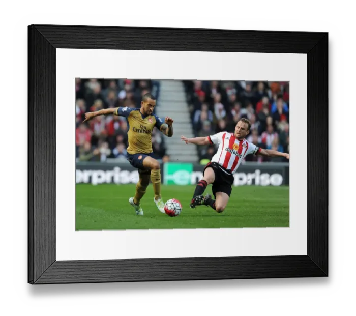 Framed Print : Theo Walcott vs. Lee Cattermole: A Premier League Showdown at Sunderland's Stadium of Light (April 2016) Framed Print : Theo Walcott vs. Lee Cattermole: A Premier League Showdown at Sunderland's Stadium of Light (April 2016)