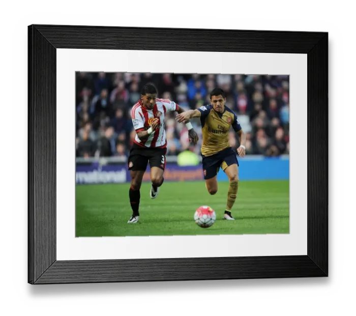 Framed Print : Arsenal's Alexis Sanchez vs. Sunderland's Deandre Yedlin: A Premier League Showdown