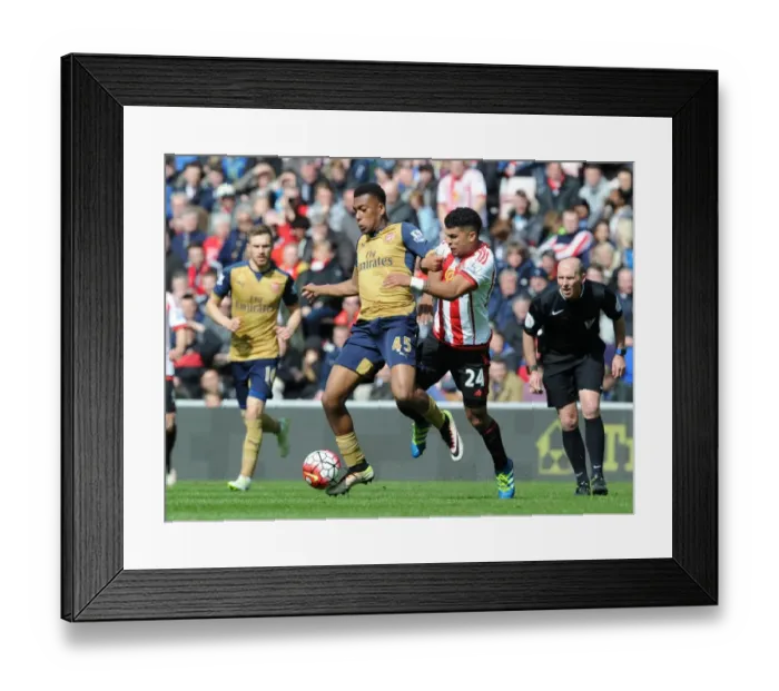 Framed Print : Alex Iwobi Outmaneuvers Deandre Yedlin: Arsenal's Thrilling Moment at Sunderland's Stadium of Light (Premier League 2015-16) Framed Print : Alex Iwobi Outmaneuvers Deandre Yedlin: Arsenal's Thrilling Moment at Sunderland's Stadium of Light (Premier League 2015-16)