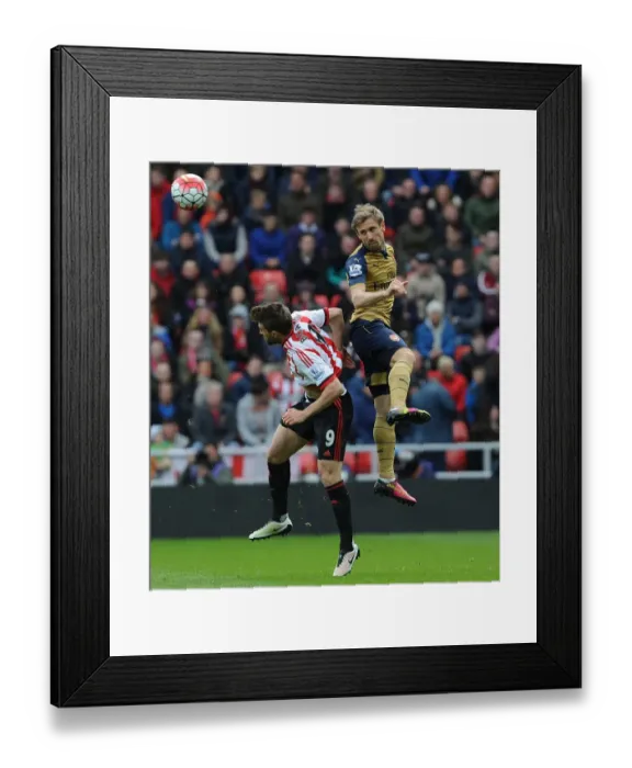 Framed Print : Monreal Soars Above Borini: Arsenal's Victory Moment vs. Sunderland, Premier League 2015-16 Framed Print : Monreal Soars Above Borini: Arsenal's Victory Moment vs. Sunderland, Premier League 2015-16