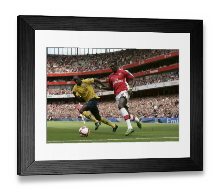 Framed Print : Emmanuel Adebayor (Arsenal) Leon Barnett (West Brom) Framed Print : Emmanuel Adebayor (Arsenal) Leon Barnett (West Brom)