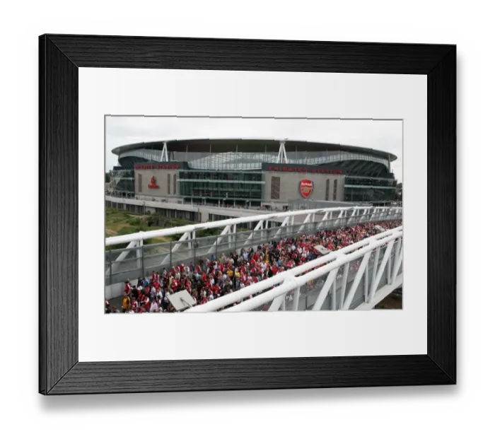 Framed Print : Arsenal fans cross the North Bridge after leaving the stadium