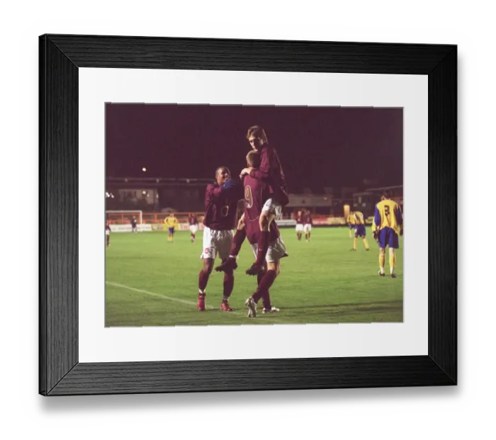 Framed Print : Arsenal's Arturo Lupoli, Nicklas Bendtner, and Jay Simpson Celebrate Goal Against Southampton Reserves Framed Print : Arsenal's Arturo Lupoli, Nicklas Bendtner, and Jay Simpson Celebrate Goal Against Southampton Reserves