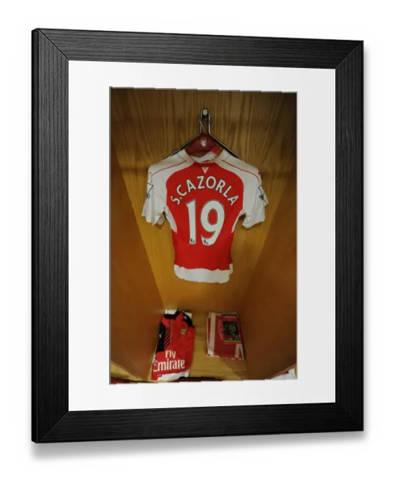 Framed Print : Santi Cazorla's Arsenal Shirt in Arsenal Dressing Room Before Arsenal vs Norwich City (2015-16)