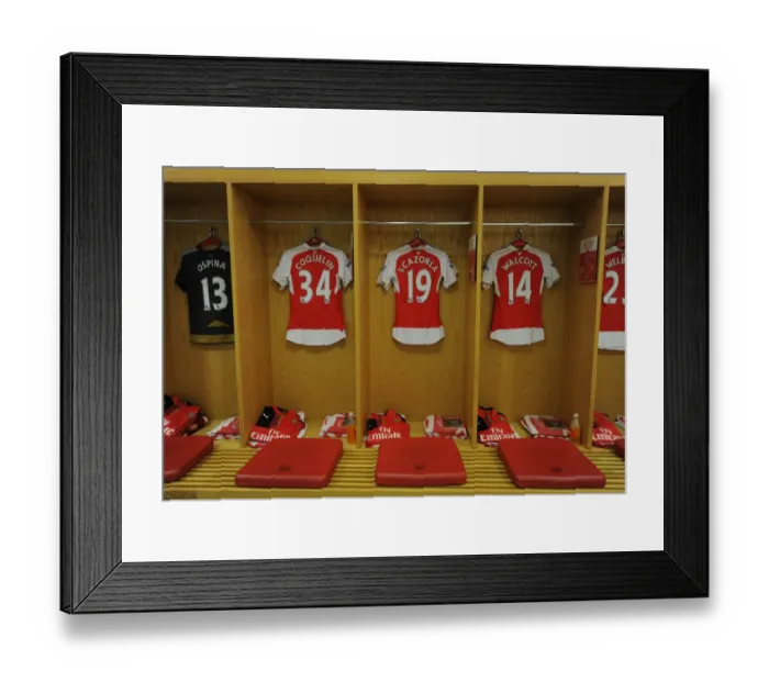 Framed Print : Arsenal Players Ospina, Coquelin, Cazorla, and Walcott Gear Up in Changing Room (2015-16)