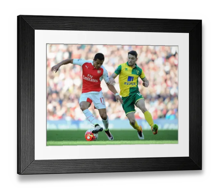 Framed Print : Clash of Stars: Sanchez vs. Brady in Arsenal's Battle Against Norwich City Framed Print : Clash of Stars: Sanchez vs. Brady in Arsenal's Battle Against Norwich City