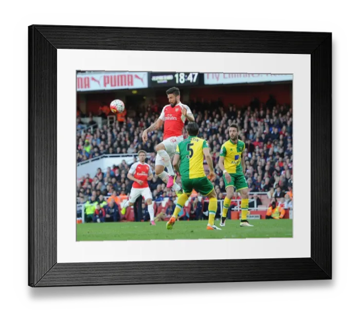 Framed Print : Giroud vs Martin: A Battle for the Ball at Arsenal vs Norwich City, Premier League 2015-16 Framed Print : Giroud vs Martin: A Battle for the Ball at Arsenal vs Norwich City, Premier League 2015-16